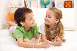 Two kids with vest headsets